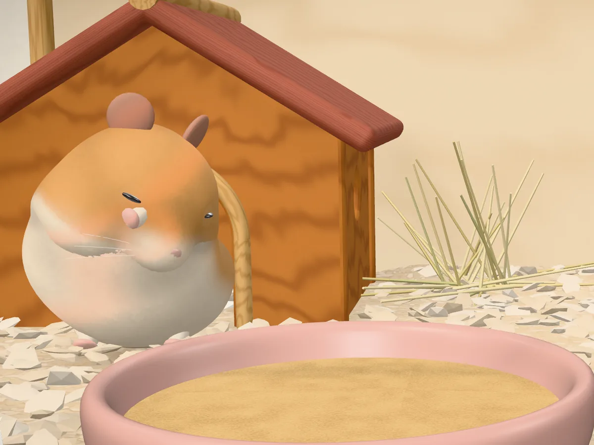 In-game: the hamster sits up beside its hut and washes its face.